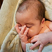 Mickey joined the competition — help win amazing prizes! baby, blanket, bodypart, face, finger, hand, happy, head, newborn, person, photography, portrait, quilt, sleeping, smile, towel, yawning