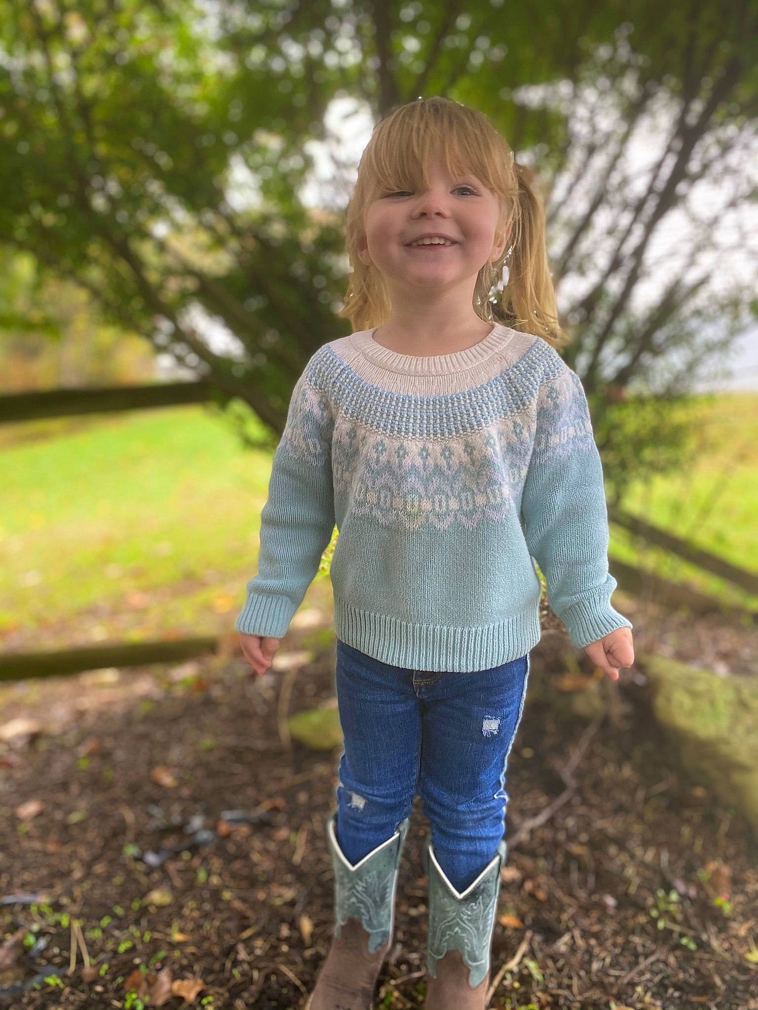 Addison joined the competition — help win amazing prizes! clothing, eye, facial_expression, fawn, grass, hair, hairstyle, happy, joy, leg, outerwear, people_in_nature, person, plant, shoulder, sleeve, smile, standing, street_fashion, sunlight