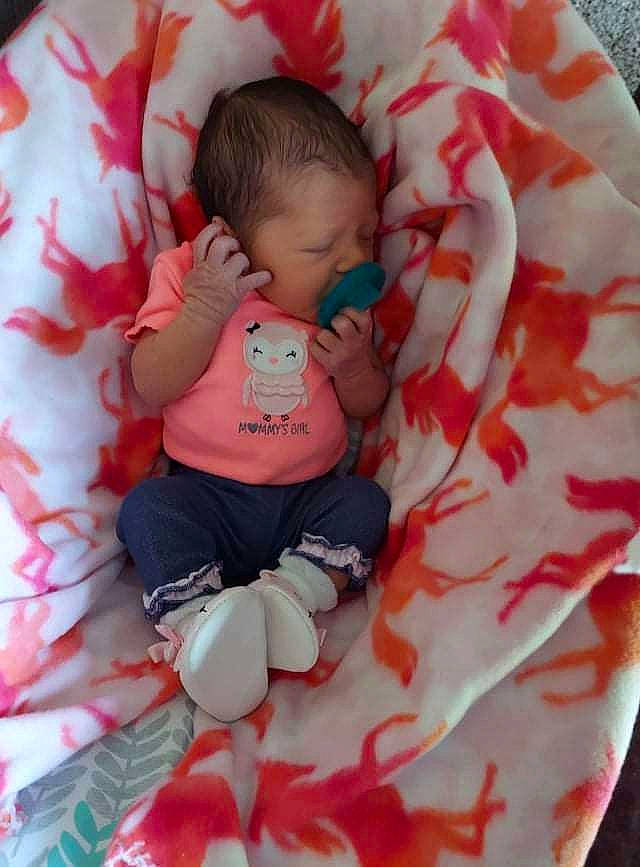 Skyla joined the competition — help win amazing prizes! baby, baby_products, baby_sleeping, baby_toddler_clothing, bedding, bedtime, carmine, child, comfort, head, linens, magenta, pattern, person, petal, pink, red, skin, sleeve, textile