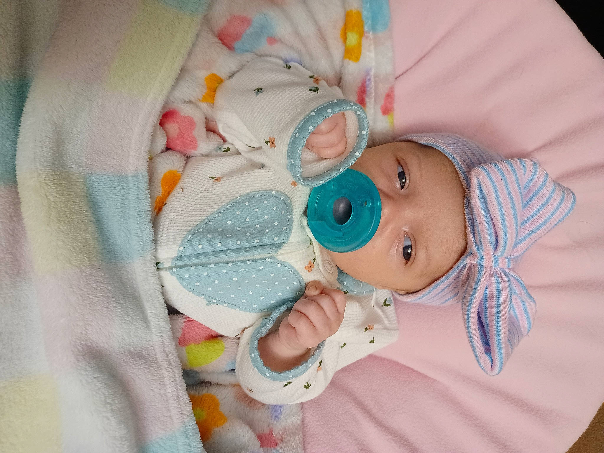 Skyla joined the competition — help win amazing prizes! arm, baby, baby_products, baby_safety, baby_sleeping, baby_toddler_clothing, baby_toys, child, comfort, face, hand, hat, headwear, linens, pattern, person, pink, plastic, room, skin