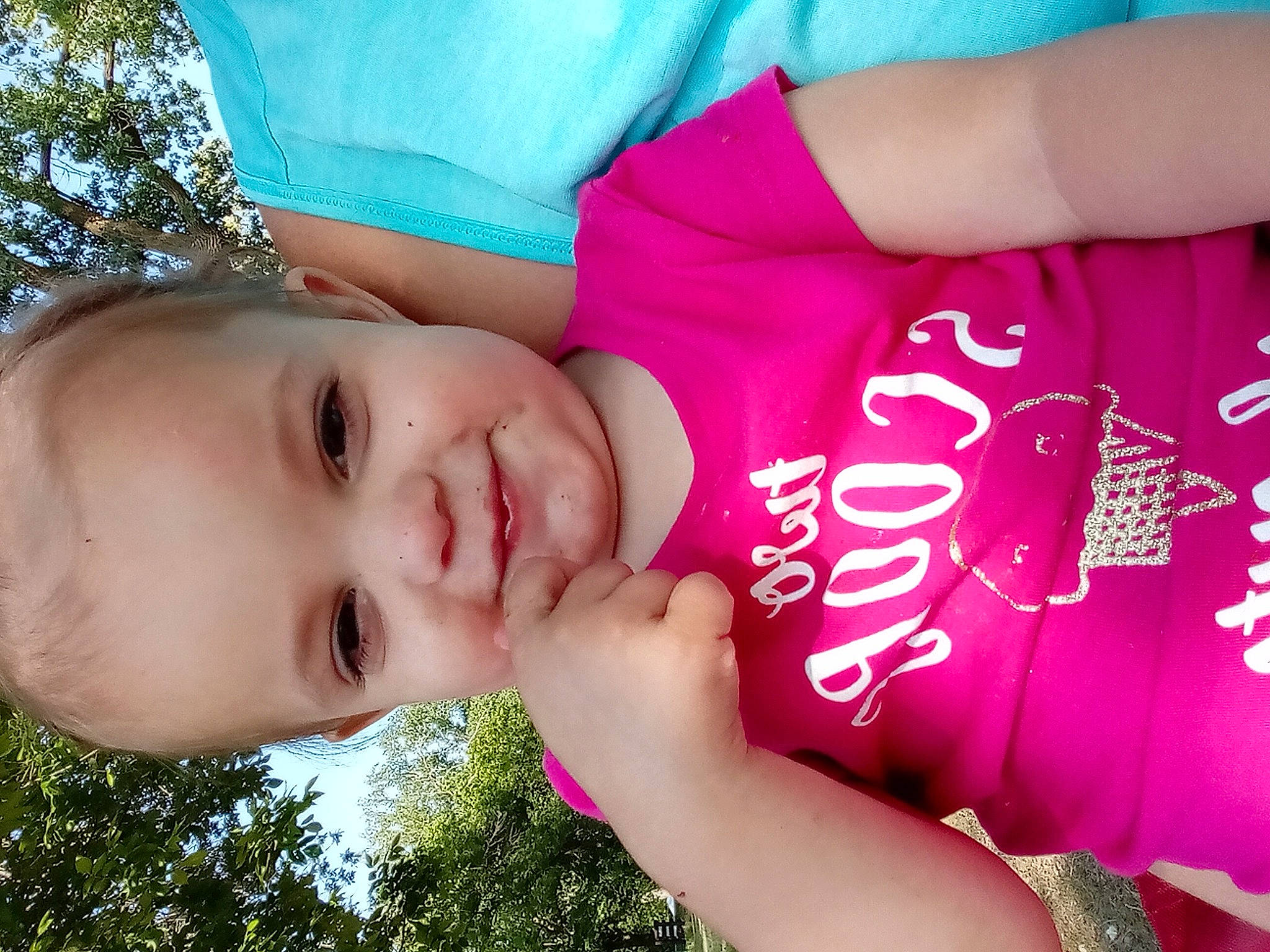 Ivory is registered to the contest to win money with this photo: baby_laughing, beauty, cheek, cool, facial_expression, finger, food, grass, happy, hat, joy, leisure, lip, magenta, people_in_nature, person, pink, plant, skin, smile