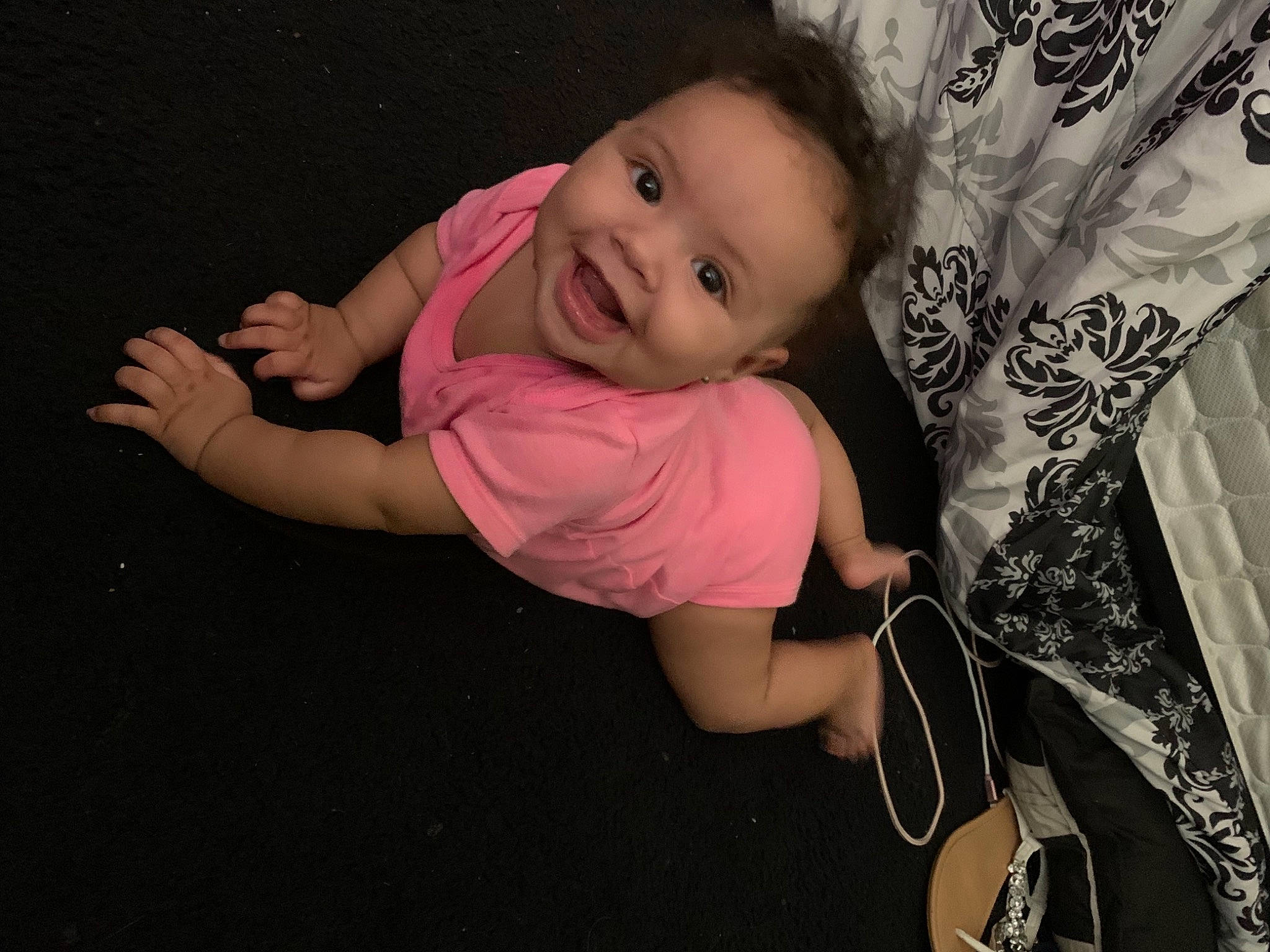 Mariyah is registered to the contest to win money with this photo: arm, baby, cheek, child, ear, eye, finger, fun, hand, happy, head, lip, person, pink, skin, smile, toddler