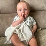 Jensen joined the competition — help win amazing prizes! baby, child, infant, blue_eyes, blanket, pacifier, couch, furniture, sitting, cute, indoors, clothing, onesie, skin, hand, foot, face, expression, comfort, relaxation