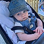Jensen joined the competition — help win amazing prizes! baby, denim_hat, blue_overalls, stroller, white_pillow, lace, baby_hands, infant, outdoor, sunlight, wooden_fence, cute, child, portrait, face, clothing, baby_seat, person, casual, closeup