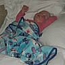 Rebekah is registered to the contest to win money with this photo: baby, bed, blanket, child, clothing, comfort, cozy, cute, face, indoors, infant, nap, peaceful, person, pillow, rest, sleeping, soft, toddler