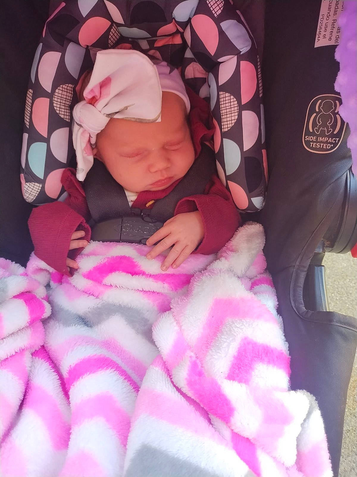 Tayland joined the competition — help win amazing prizes! baby, baby_sleeping, baby_toddler_clothing, carmine, child, comfort, headwear, human_body, linens, magenta, mouth, nail, pattern, person, pink, product, purple, sleeve, textile, thumb