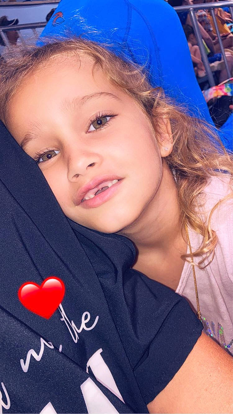 Devyn is registered to the contest to win money with this photo: black_hair, blue, chin, cool, eye, eyebrow, eyelash, facial_expression, flash_photography, hair, hairstyle, happy, head, iris, joy, lip, mouth, organ, person, pink