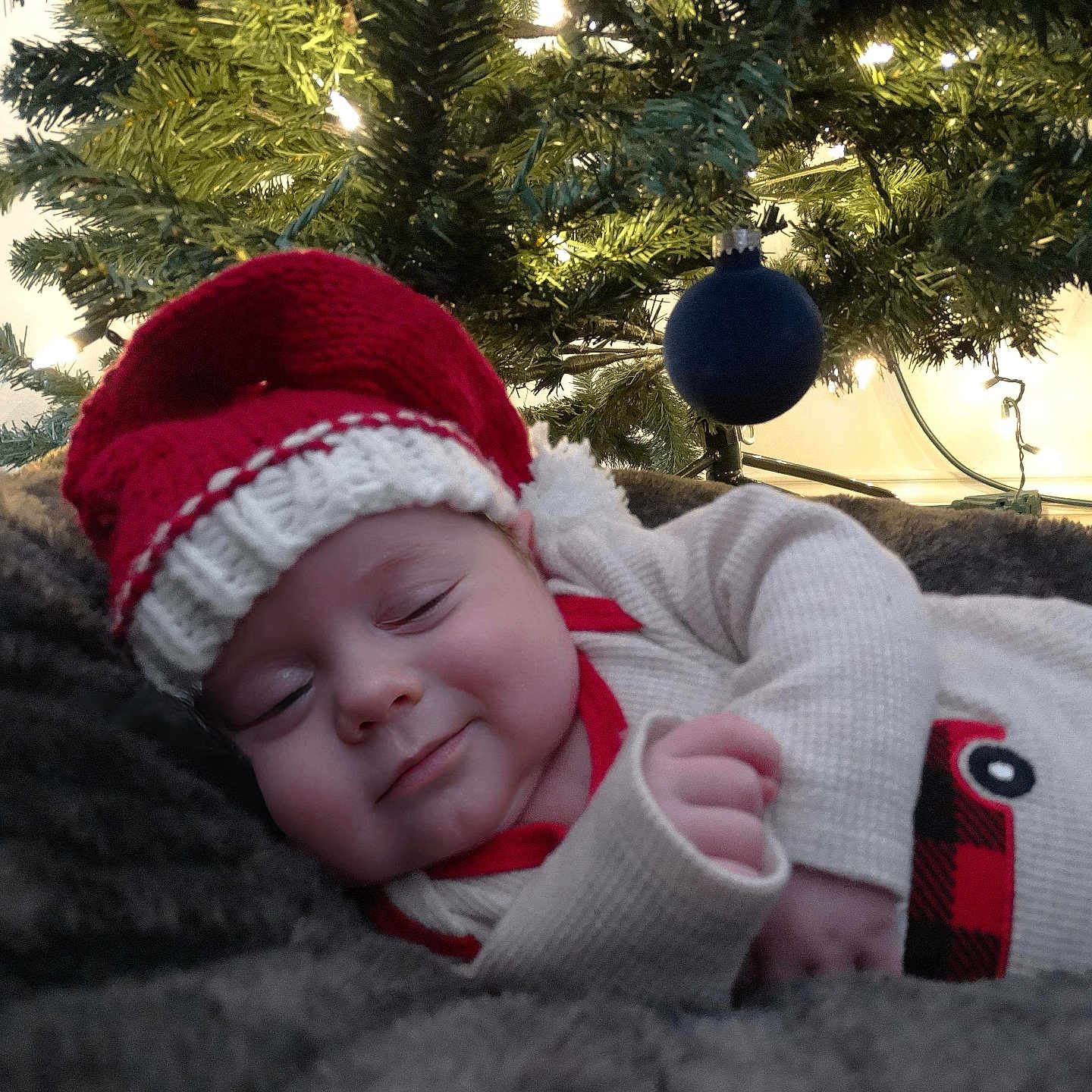 Cody joined the competition — help win amazing prizes! astronomy, baby, beanie, bonnet, cap, clothing, conifer, face, fir, hat, head, hood, knitwear, outerspace, person, photography, plant, sphere, sweater, tree