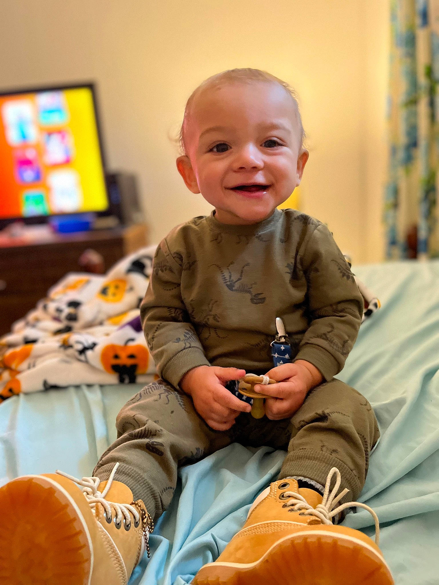 Javon joined the competition — help win amazing prizes! baby, calabaza, child, curtain, event, facial_expression, flooring, fun, happy, head, joy, person, play, pumpkin, room, sitting, skin, smile, sneakers, soil