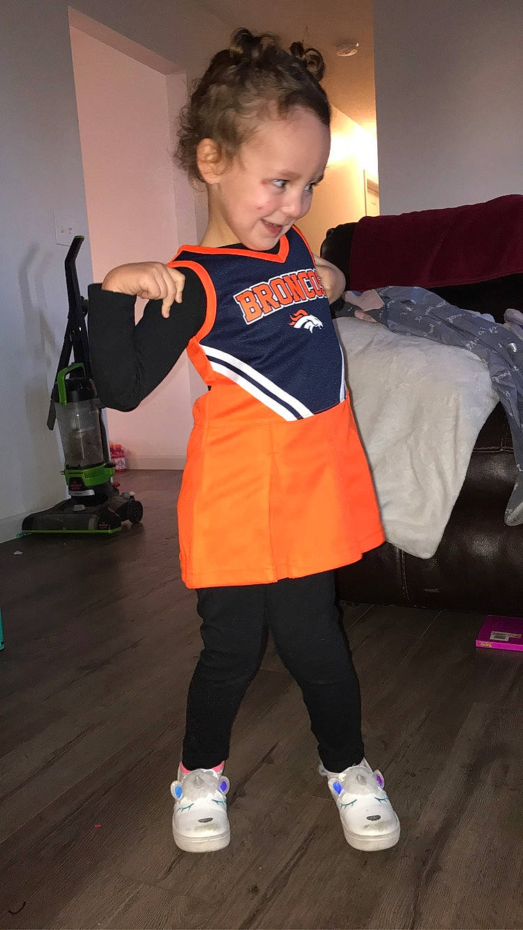 Ava joined the competition — help win amazing prizes! active_pants, balance, couch, joy, outdoor_shoe, person, pillow, sneakers, sock, sweatpant, throw_pillow, toddler, walking_shoe