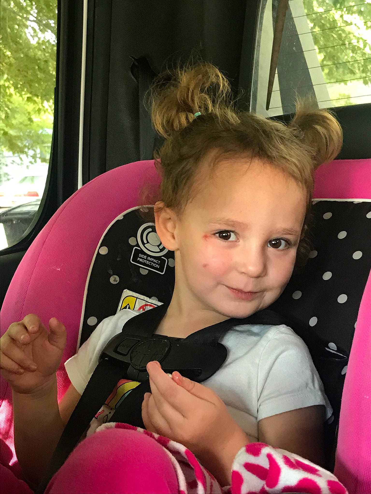 Ava is registered to the contest to win money with this photo: arm, baby, baby_toddler_clothing, blond, car_seat, child, eye, eyelash, finger, hand, joy, mammal, nail, person, pink, polka_dot, thumb, toddler