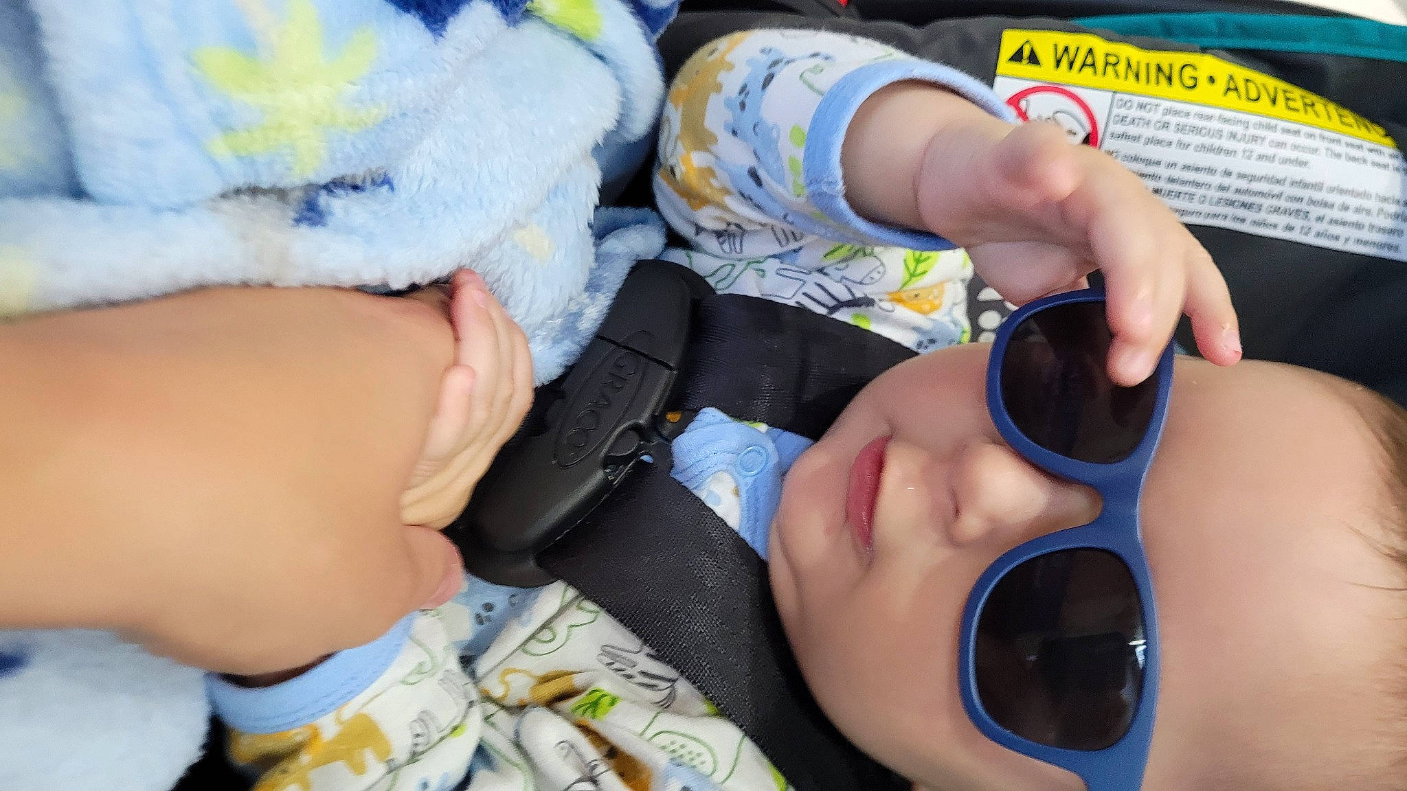 Lucas is registered to the contest to win money with this photo: comfort, drinkware, eyewear, finger, foot, gesture, goggles, hat, headgear, human_leg, mouth, nail, pattern, person, personal_protective_equipment, plastic, sunglasses, thigh, thumb, vision_care