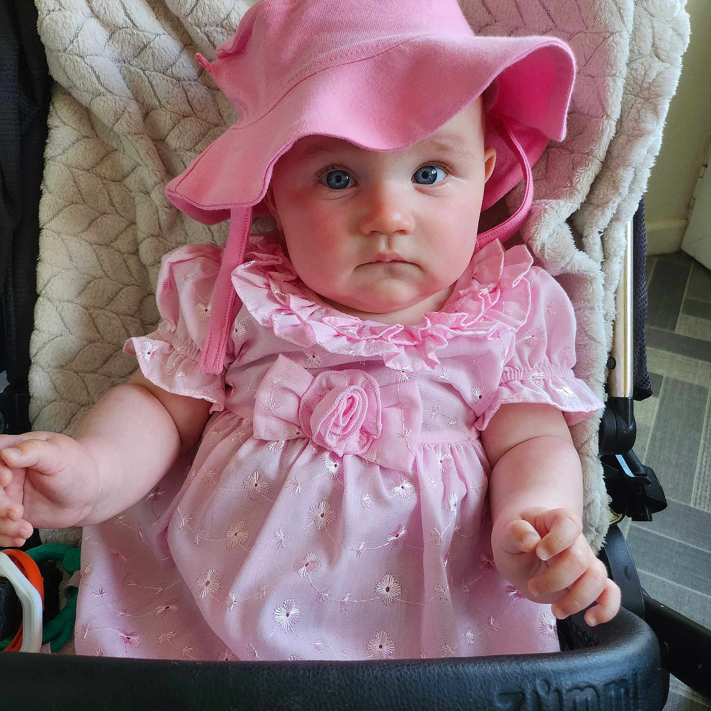 Emily Rose is registered to the contest to win money with this photo: baby, bonnet, cap, car, clothing, costume, cowboyhat, dress, face, furniture, hat, head, person, photography, portrait, sitting, stroller, sunhat, toy, transportation