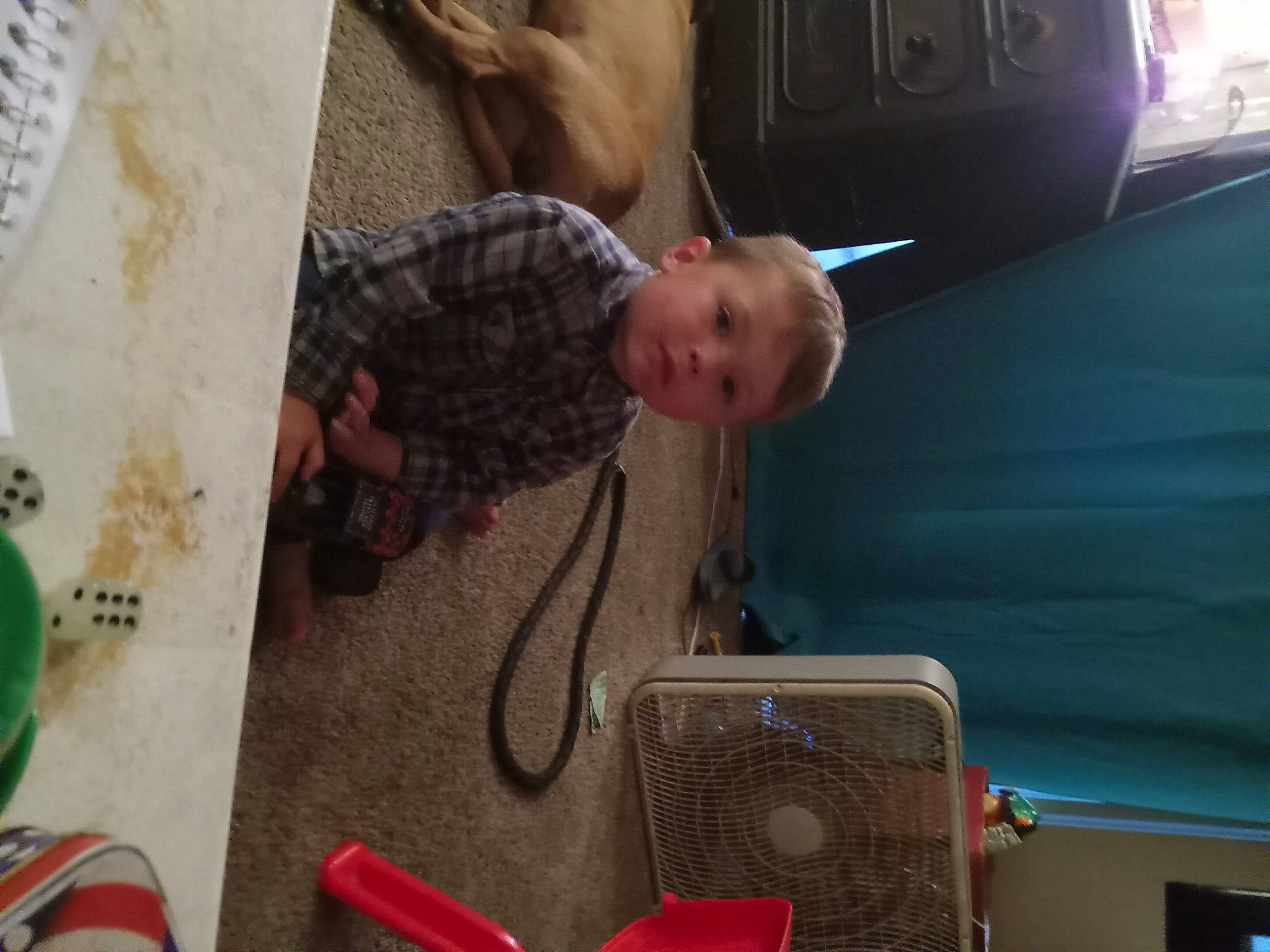 Isaiah is registered to the contest to win money with this photo: audio_equipment, auto_part, automotive_exterior, baby, baby_products, child, comfort, electrical_wiring, flooring, fun, leisure, person, play, room, shorts, sitting, t_shirt, toddler, vehicle_door, wire