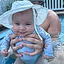 Rosalia joined the competition — help win amazing prizes! adult, baby, blue_clothing, child, expression, face, fence, hands, hat, holding, infant, onesie, outdoor, pool, skin, summer, sunhat, swimming, water, water_ripples