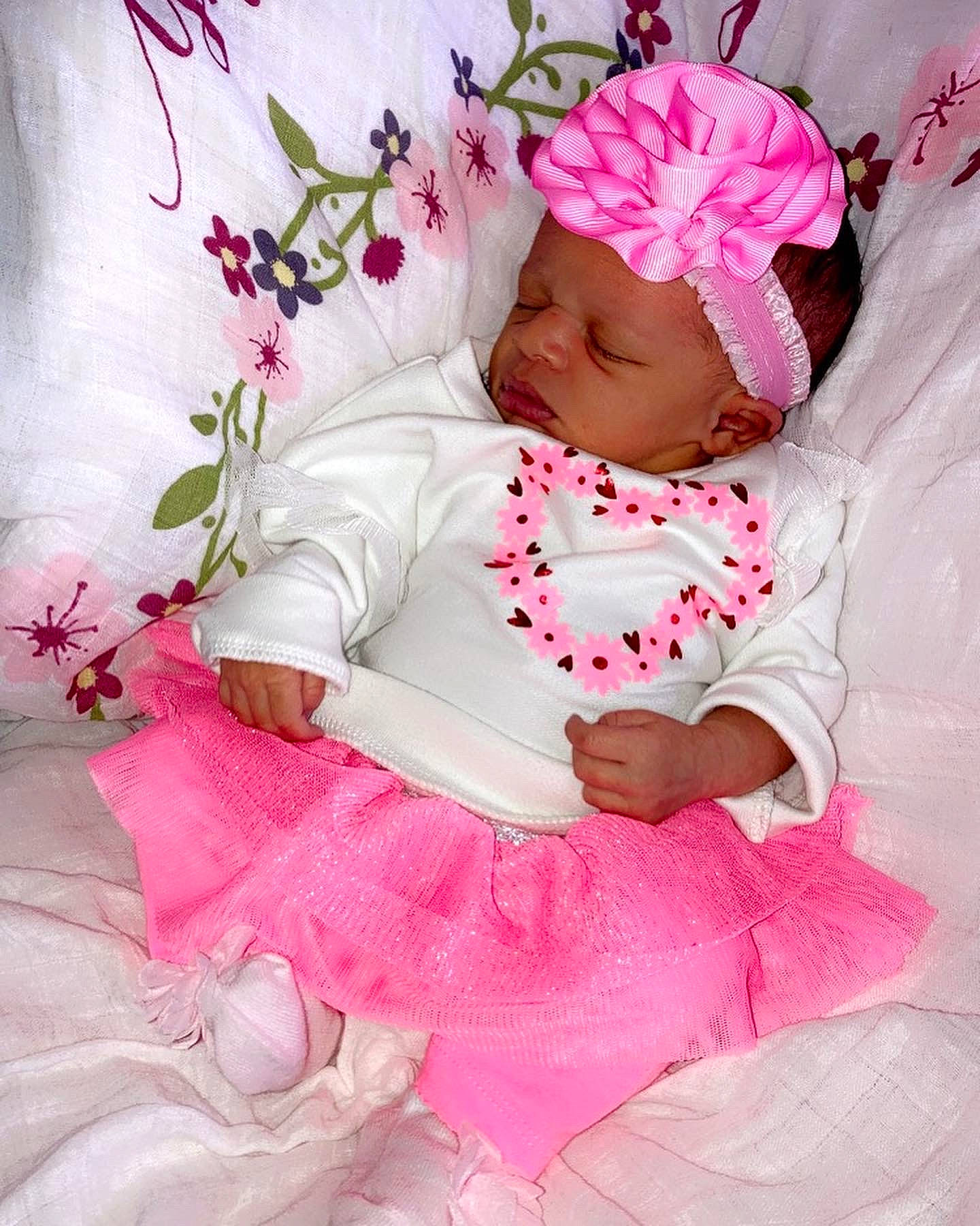 Lakelynn joined the competition — help win amazing prizes! arm, baby, baby_products, baby_toddler_clothing, child, comfort, fashion_accessory, hair_accessory, happy, headgear, headwear, linens, magenta, pattern, peach, person, petal, pink, rose, rose_family