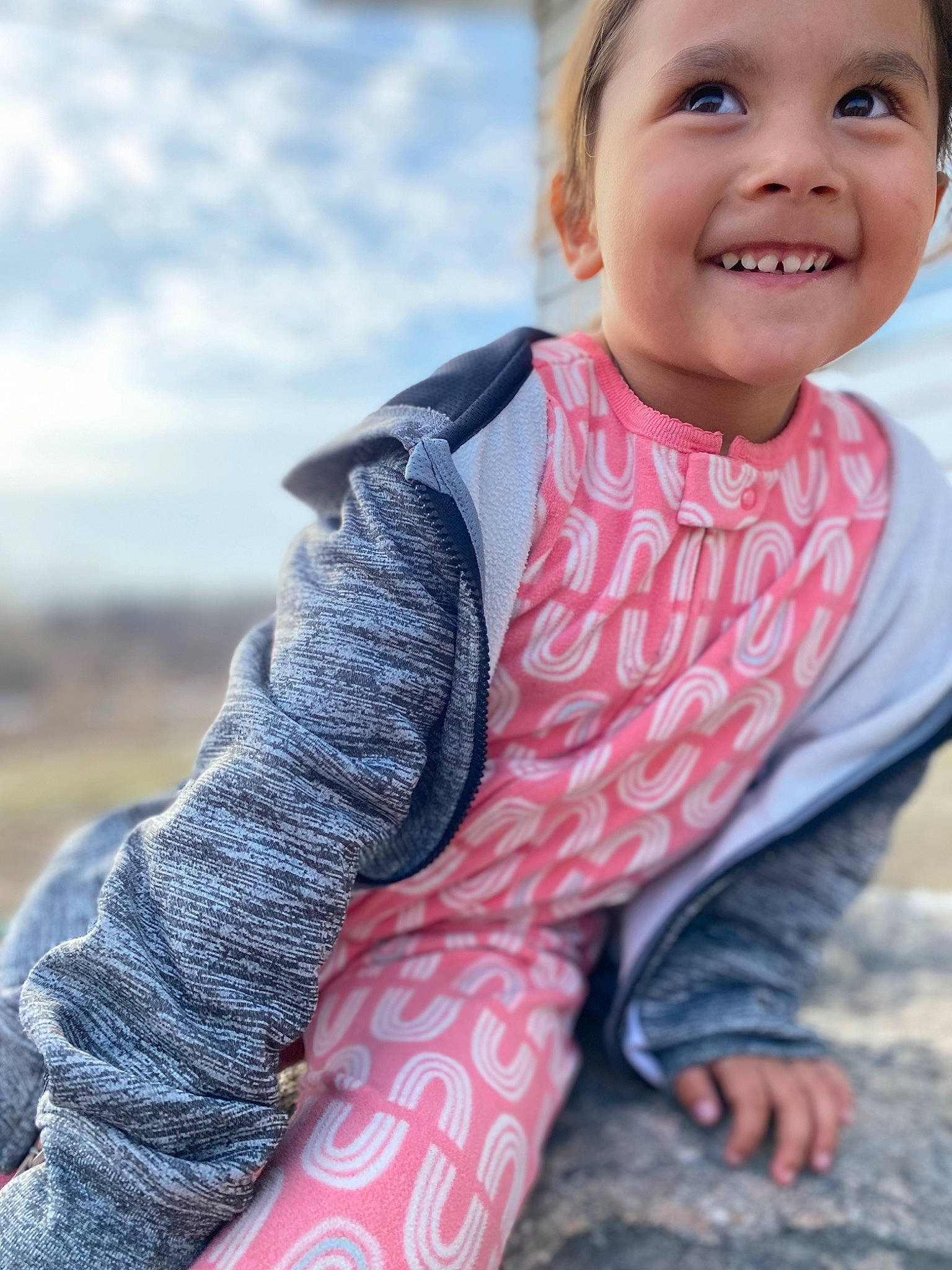 Aarilynn is registered to the contest to win money with this photo: azure, baby_toddler_clothing, child, cloud, cool, electric_blue, face, finger, grass, happy, head, iris, joy, lip, neck, pattern, person, skin, sky, sleeve