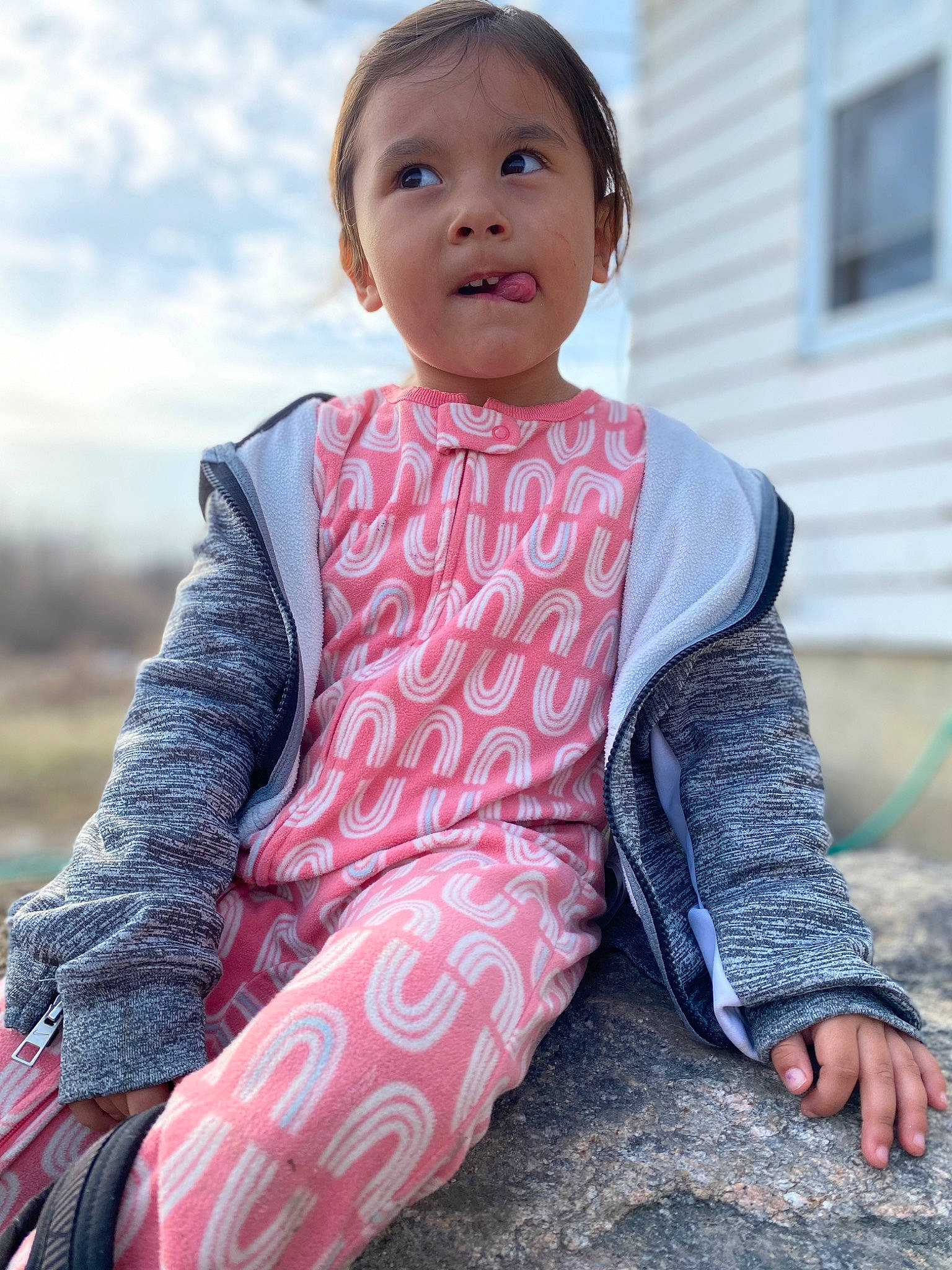 Aarilynn is registered to the contest to win money with this photo: baby_toddler_clothing, child, cloud, cool, dress, electric_blue, grass, happy, leisure, magenta, neck, pattern, person, pink, shoulder, sitting, sky, sleeve, t_shirt, toddler