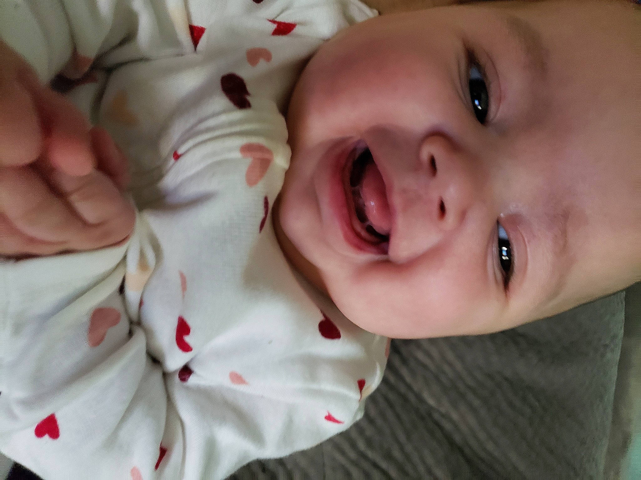 Ensley joined the competition — help win amazing prizes! baby, baby_toddler_clothing, cheek, chin, clothing, eye, eyebrow, finger, gesture, hand, happy, human_body, iris, lip, mouth, nose, person, skin, sleeve, smile