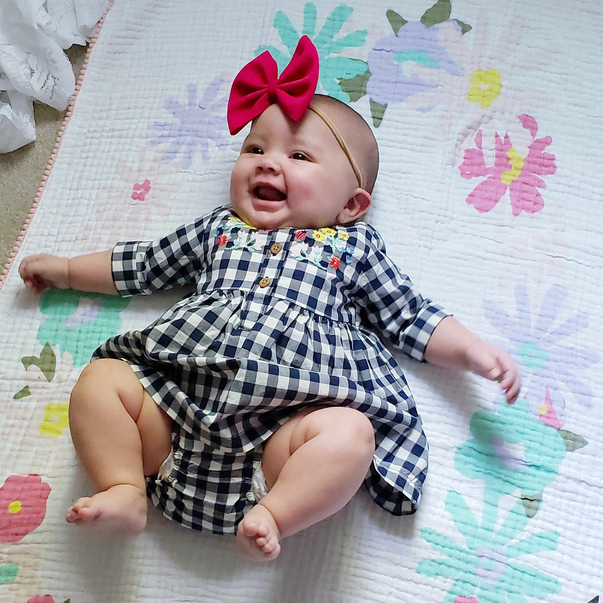 Ensley joined the competition — help win amazing prizes! arm, baby, baby_toddler_clothing, child, comfort, design, font, happy, linens, magenta, pattern, pink, plaid, product, skin, sleeve, t_shirt, tartan, textile, toddler