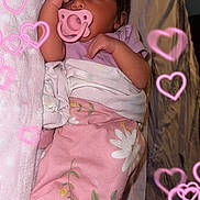 Ellie joined the competition — help win amazing prizes! baby, newborn, sleeping, pacifier, pink, blanket, floral, hearts, overlay, cute, infant, wrapped, cozy, soft, clothing, resting, hand, face, indoors, child