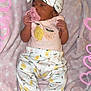 Ellie is registered to the contest to win money with this photo: baby, pacifier, blanket, hat, pajamas, infant, cute, sleepwear, heart_overlay, pink, soft_texture, newborn, child, patterned_clothing, lying_down, cozy, adorable, face, small_hands, resting