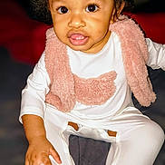 Zuri joined the competition — help win amazing prizes! toddler, child, baby, face, eyes, hair, clothing, pajamas, vest, pink, white, sitting, hand, foot, indoor, portrait, cute, expression, skin, person