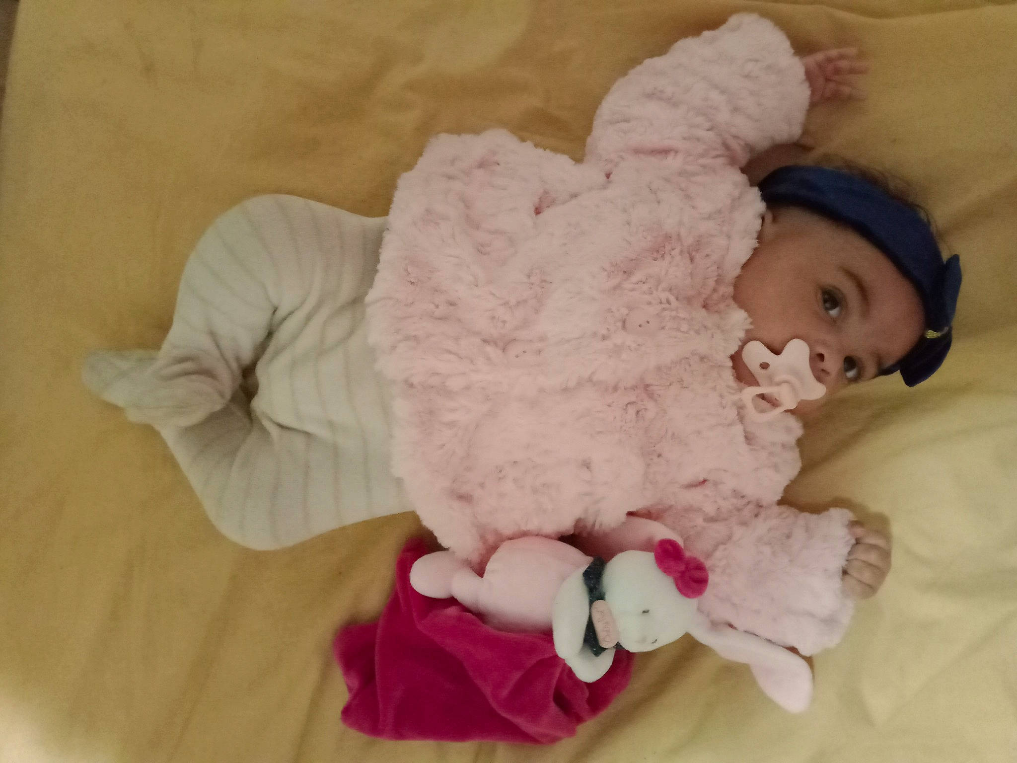 Mélodye participe au concours pour gagner de l'argent avec cette photo : baby, baby_products, baby_sleeping, baby_toddler_clothing, cheek, child, comfort, dress, eye, fur, head, headwear, linens, magenta, person, pink, plush, sleeve, stuffed_toy, teddy_bear