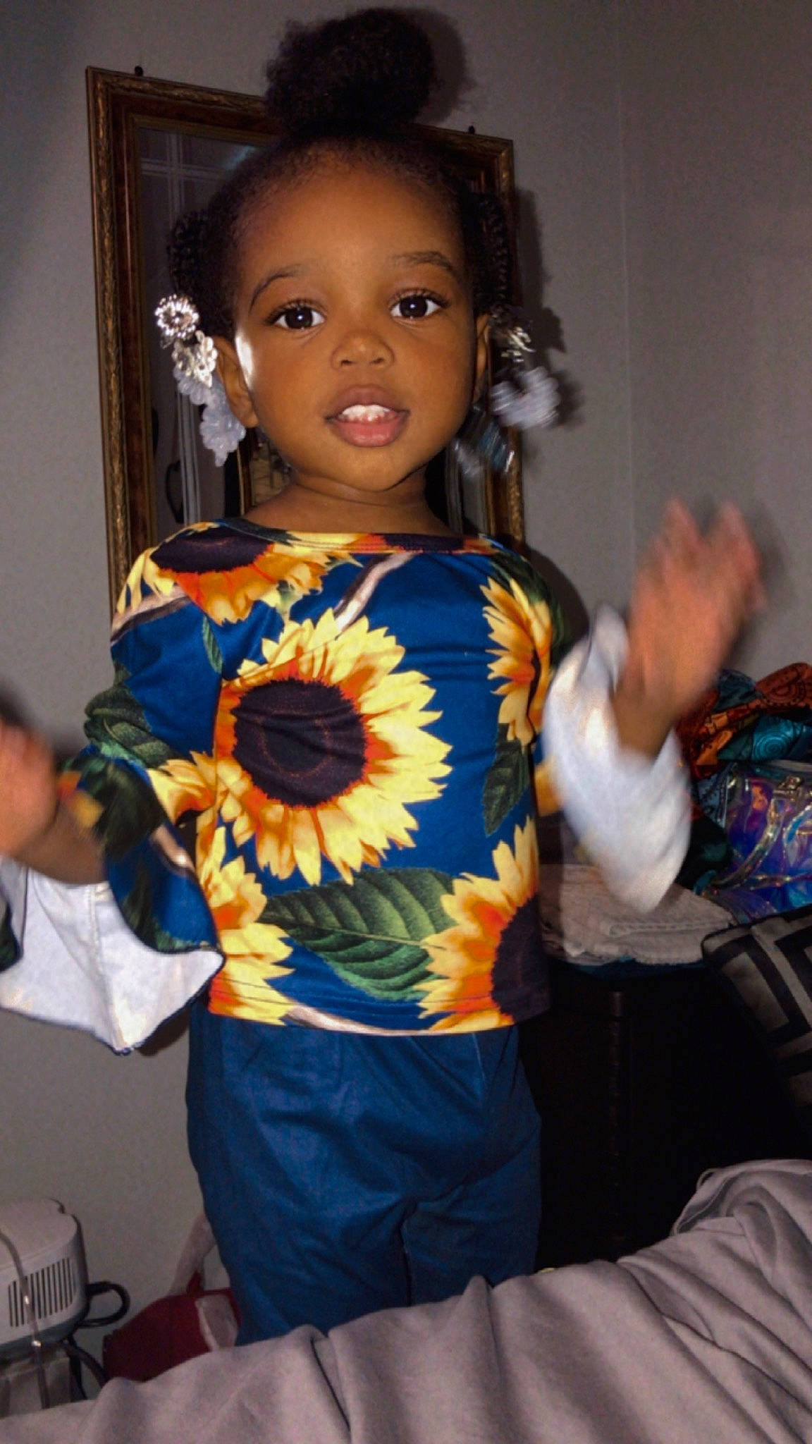 Ariyah is registered to the contest to win money with this photo: baby_toddler_clothing, bangle, chair, child, costume, event, eye, fashion_design, flower, fun, happy, head, iris, jewellery, necklace, party, person, room, t_shirt, toddler