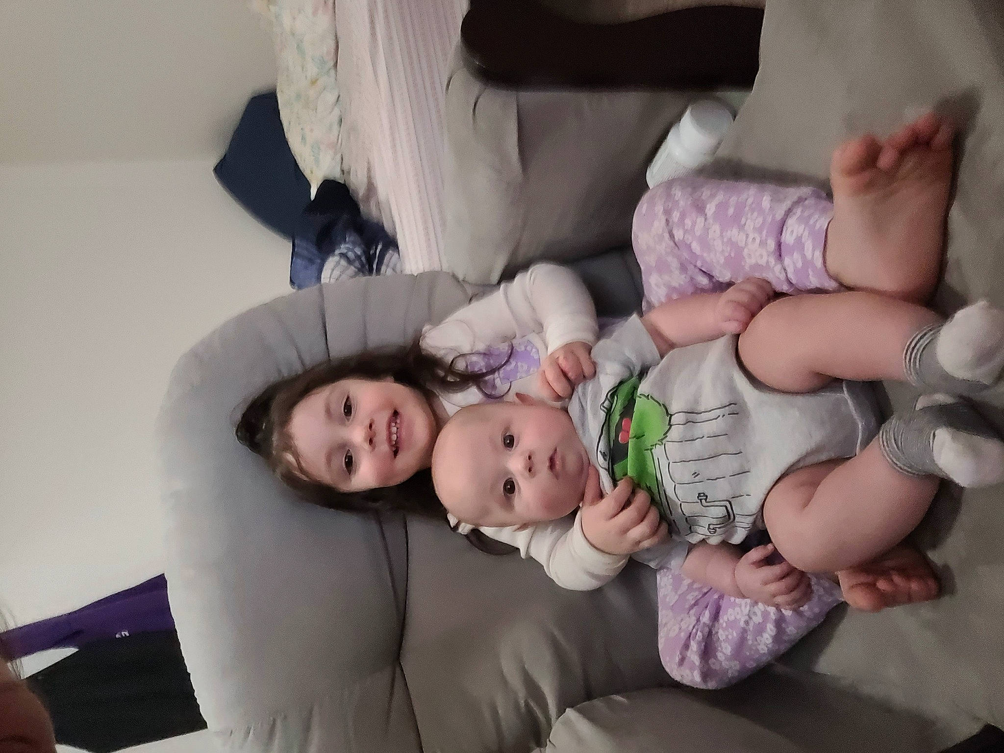 Kenslea joined the competition — help win amazing prizes! arm, baby, child, comfort, couch, event, flash_photography, fun, happy, human_leg, joy, lap, mammal, person, product, purple, room, sitting, skin, thigh