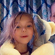 Jayla is registered to the contest to win money with this photo: accessories, baby, bodypart, clothing, costume, couch, curtain, cushion, face, finger, furniture, glove, head, homedecor, person, photography, plush, portrait, selfie, toy