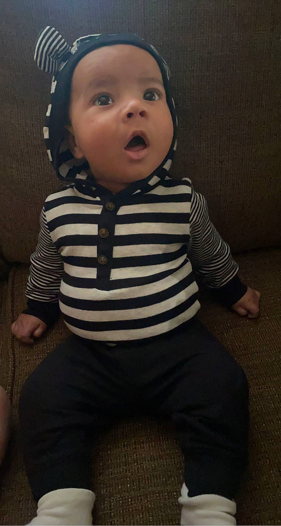 Jakai joined the competition — help win amazing prizes! baby, baby_toddler_clothing, black, cheek, child, comfort, face, finger, flash_photography, fun, happy, headwear, monochrome, monochrome_photography, pattern, person, portrait_photography, sitting, sleeve, surprise