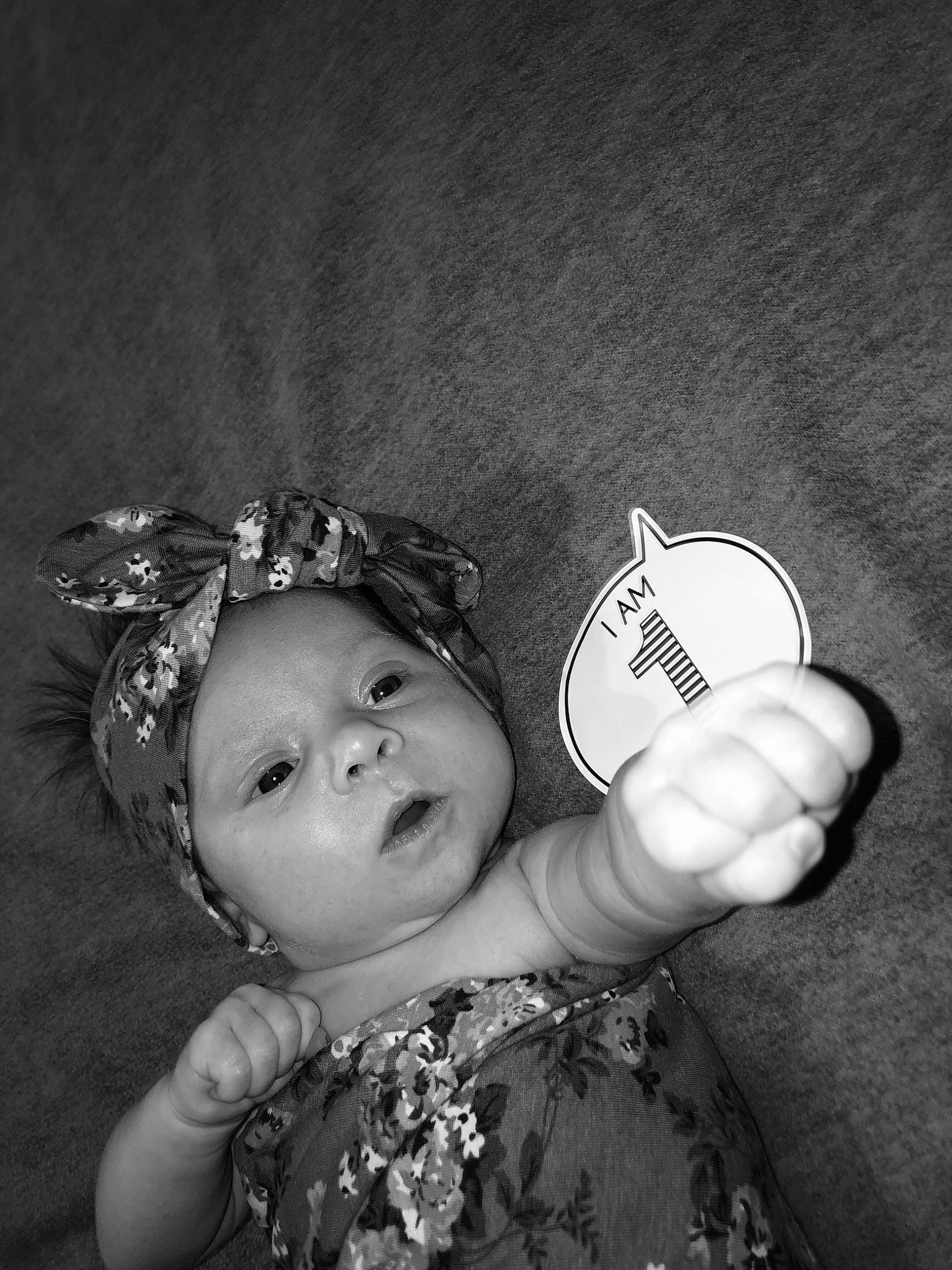 Avalee is registered to the contest to win money with this photo: baby, black_and_white, child, fashion_accessory, finger, fun, hand, happy, monochrome, monochrome_photography, person, photography, style, toddler