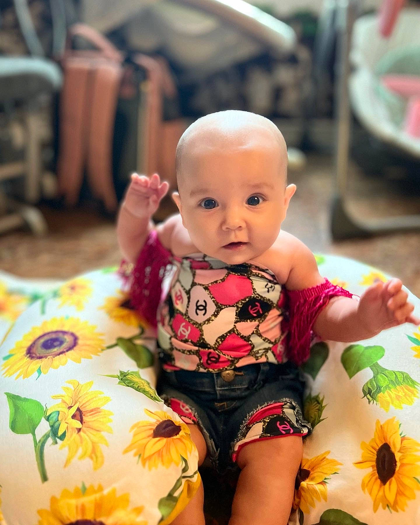 Bonnie joined the competition — help win amazing prizes! baby, baby_toddler_clothing, cheek, child, doll, facial_expression, fun, happy, human_leg, orange, people, person, photograph, sitting, skin, summer, textile, thigh, toddler, toy