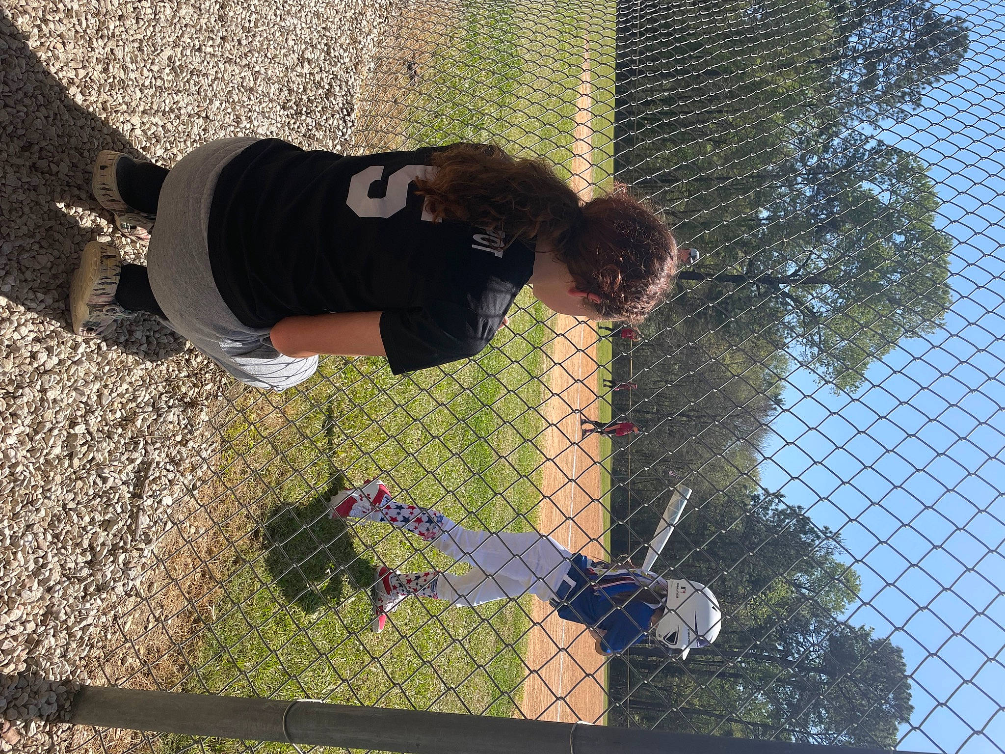 Layni Alyrain joined the competition — help win amazing prizes! chain_link_fencing, fence, fun, grass, green, leisure, mesh, net, pattern, people_in_nature, plant, recreation, reflection, shrub, sky, soil, sports_equipment, tree, wire, wire_fencing