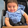 baby, child, infant, stroller, smiling, happy, portrait, face, indoor, seated, harness, blue_clothing, brown_hair, baby_carriage, wheel, safety_belt, cheeks, close_up, photography, cute