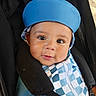 baby, child, infant, stroller, sunhat, blue_hat, checkered_outfit, blue_and_white, portrait, face, eyes, looking_at_camera, outdoor, seated, safety_harness, carriage, cheeks, photography, adorable, travel