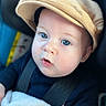Maël participe au concours pour gagner de l'argent avec cette photo : baby, child, blue_eyes, cap, car_seat, blanket, clothing, face, hand, infant, portrait, seatbelt, soft_lighting, cute, young_child, close_up, person, headwear, indoors, expression