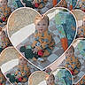 child, toddler, baby, pajamas, toy, mickey_mouse, plush_toy, quilt, blanket, heart_shape, collage, pattern, indoor, floor, cute, sitting, person, portrait, colorful, playful