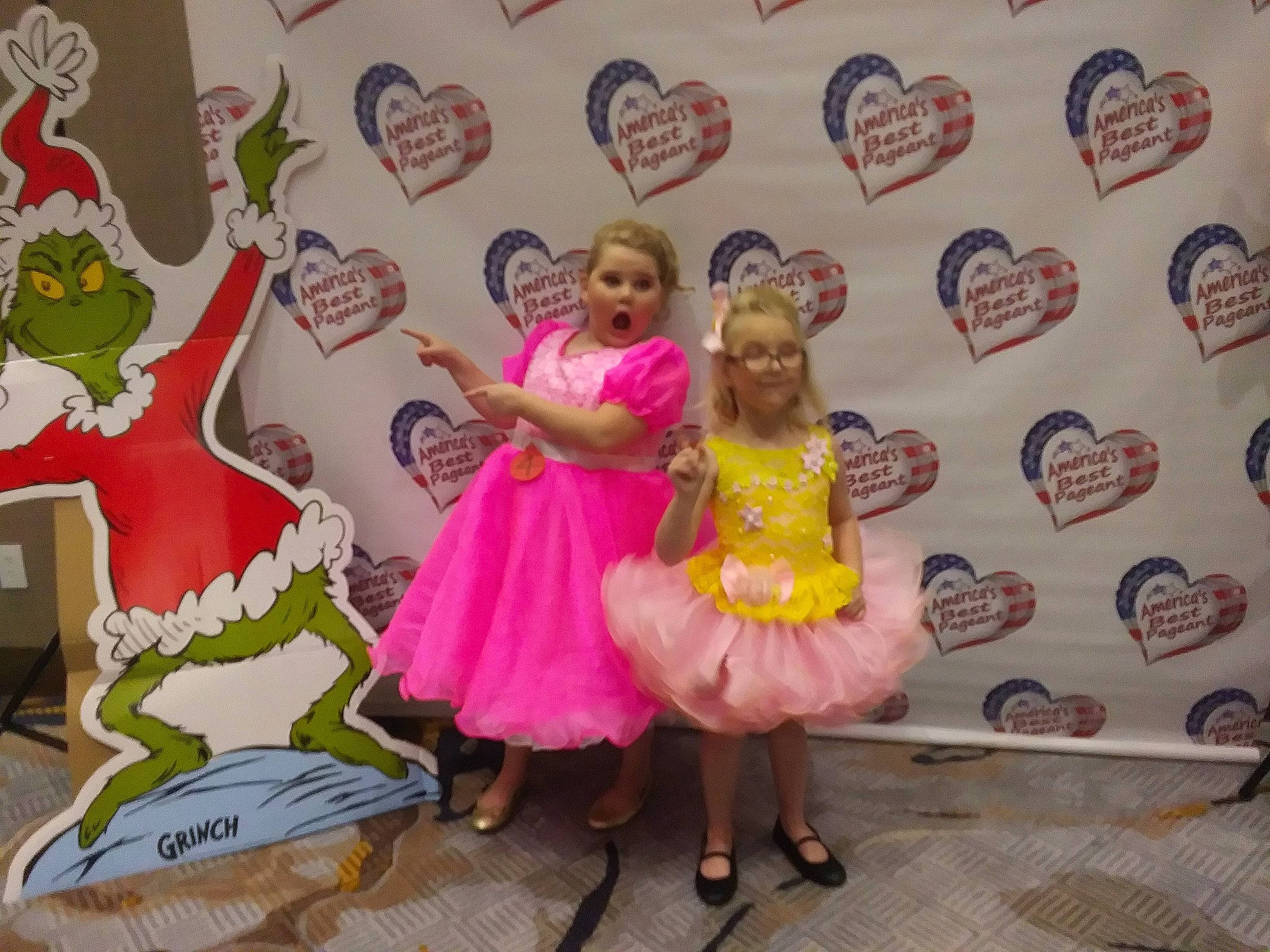 Emmie is registered to the contest to win money with this photo: baby_toddler_clothing, day_dress, doll, dress, embellishment, fictional_character, fish, heart, joy, love, magenta, marine_mammal, mythical_creature, one_piece_garment, person, pink, ruffle, surprise, toy