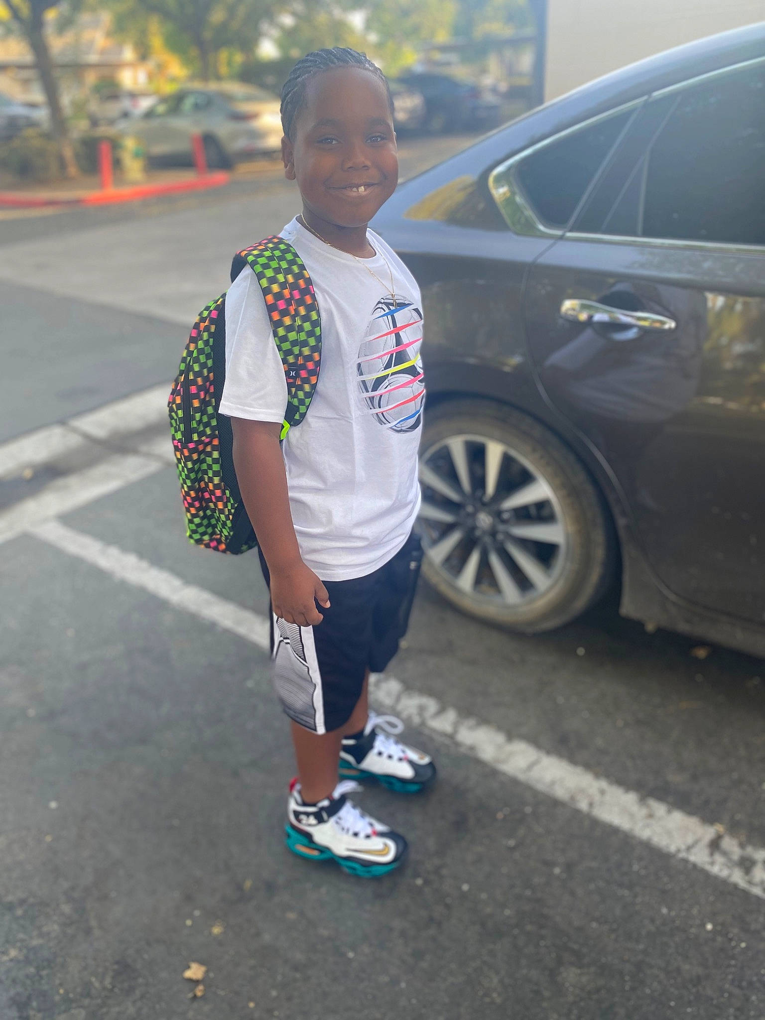 Dion is registered to the contest to win money with this photo: asphalt, automotive_design, automotive_exterior, automotive_lighting, automotive_tire, car, electric_blue, eyewear, joy, land_vehicle, motor_vehicle, person, personal_luxury_car, recreation, rim, smile, street_fashion, t_shirt, tire, vehicle