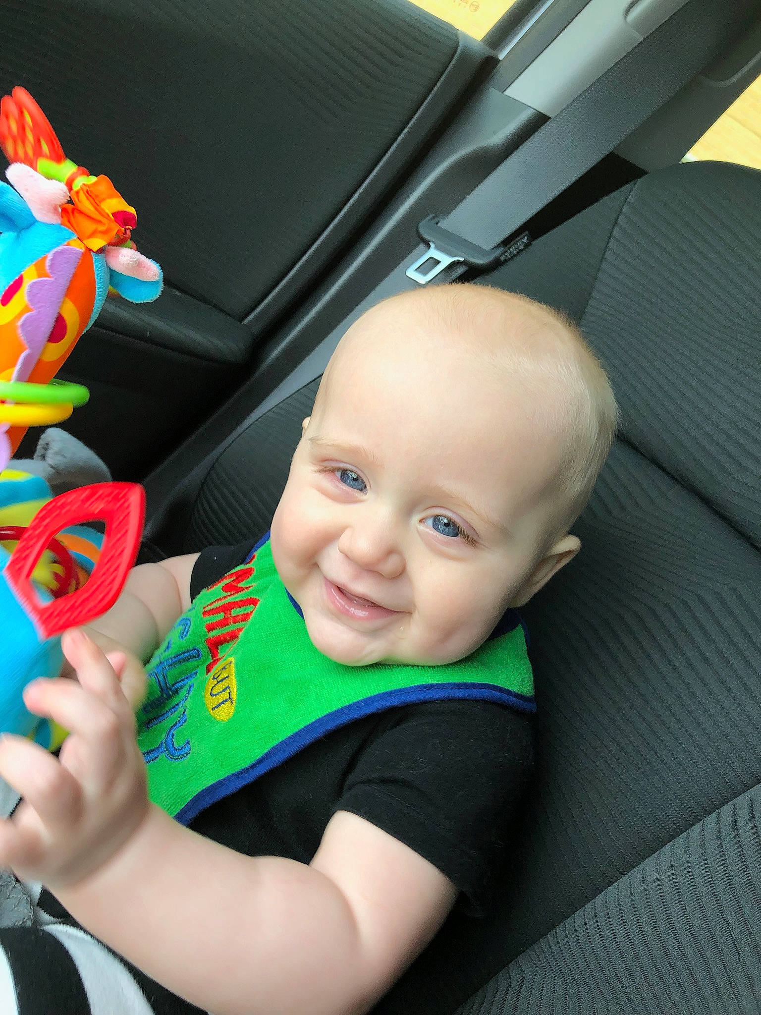Aaron Jr joined the competition — help win amazing prizes! auto_part, baby, car_seat, child, ear, joy, person, product, sitting, skin, toddler, toy, vacation