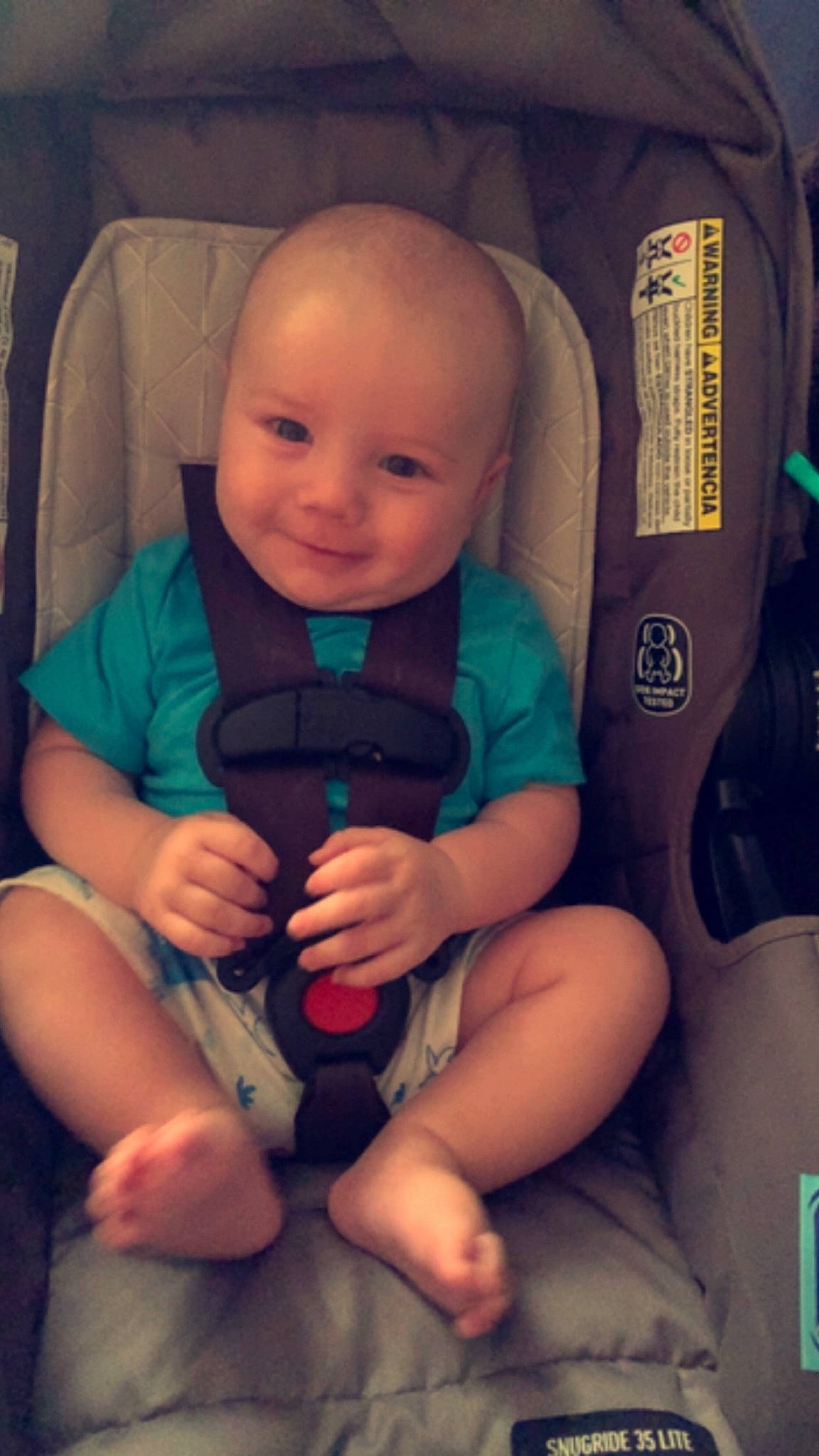 Landon is registered to the contest to win money with this photo: baby_carriage, baby_in_car_seat, car_seat, cheek, comfort, cool, finger, gesture, happy, joy, knee, lap, mouth, nail, person, product, seat_belt, skin, smile, thigh