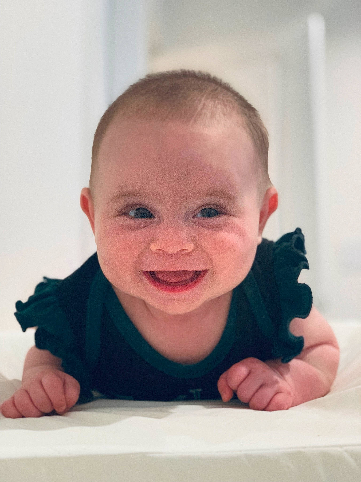 Giselle is registered to the contest to win money with this photo: arm, baby, cheek, child, chin, ear, eye, face, facial_expression, finger, hand, head, joy, lip, mouth, nose, person, skin, smile, thumb