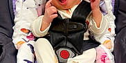 Rynleigh joined the competition — help win amazing prizes! baby, infant, car_seat, blanket, floral_pattern, pajamas, face, hands, feet, butterfly_pattern, seatbelt, child, cute, newborn, expression, comfort, soft, indoor, portrait, wearing