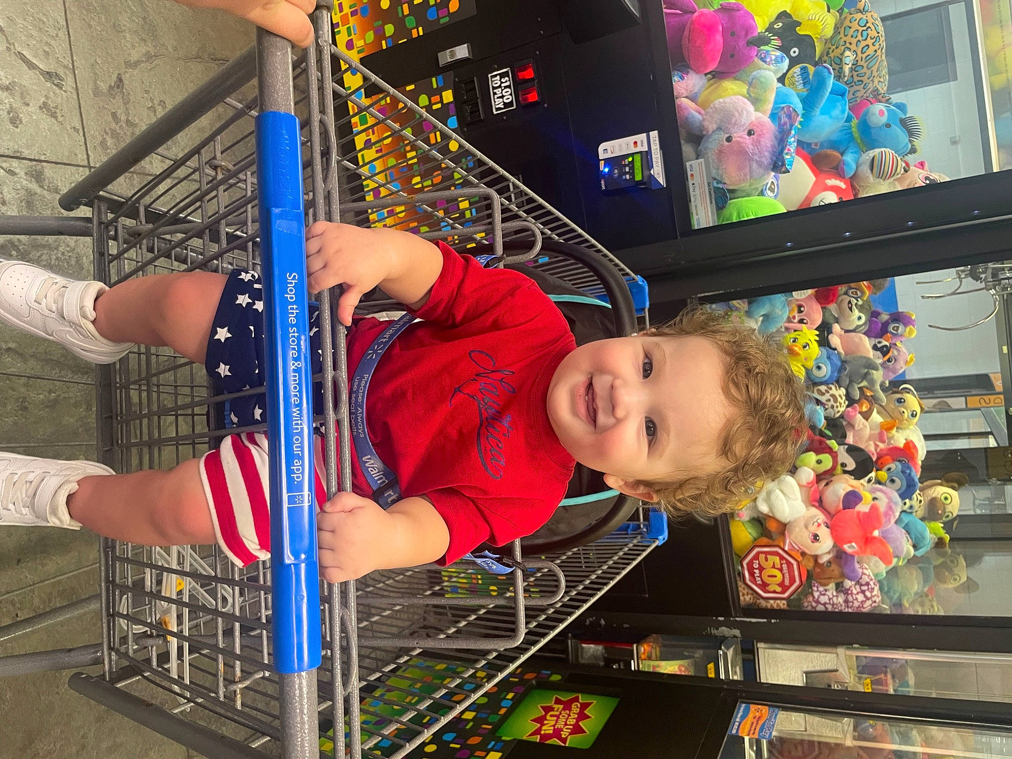 Cillian is registered to the contest to win money with this photo: baby, baby_toddler_clothing, baby_toys, child, display_device, electric_blue, engineering, fun, joy, leisure, person, play, recreation, shorts, t_shirt, toddler, toy, visual_arts