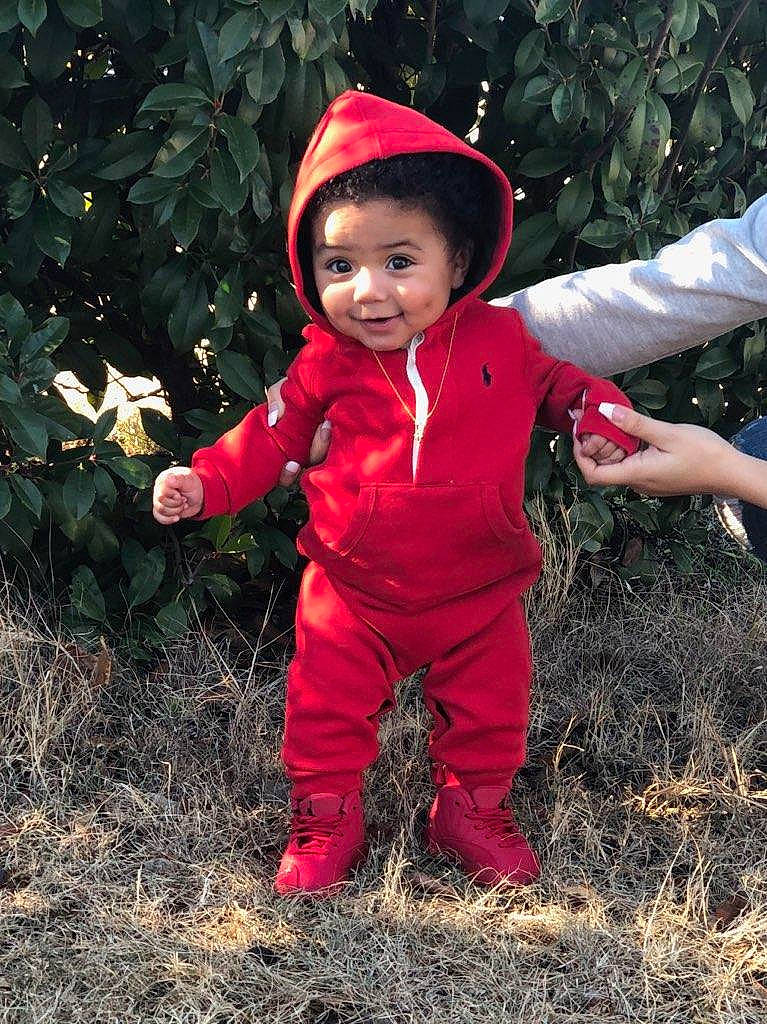 Benji joined the competition — help win amazing prizes! child, christmas, costume, fun, girl, grass, happiness, holiday, infant, person, plant, red, smile, toddler, tree