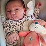 Jade participe au concours pour gagner de l'argent avec cette photo : baby, infant, face, person, plush_toy, stuffed_animal, white_bunny, pink_toy, leopard_print, clothing, hand, fist, lying_down, bed, blanket, cute, soft_toys, indoors, portrait, newborn