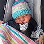 baby, sleeping, car_seat, blanket, knitted_hat, pastel_colors, child, infant, cute, cozy, striped, warm, clothing, seatbelt, peaceful, resting, soft, newborn, portrait, indoors