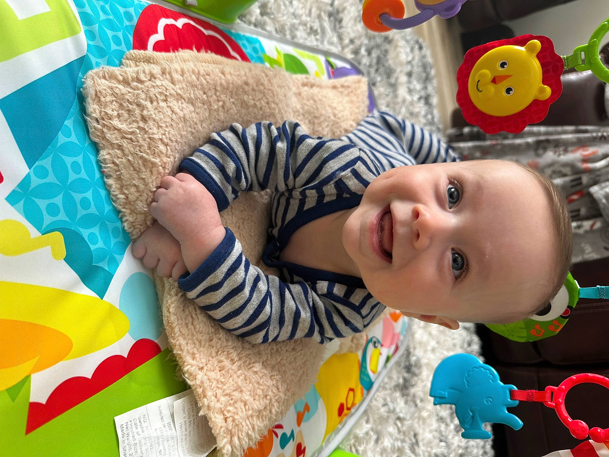 Kingston is registered to the contest to win money with this photo: art, baby, baby_playing_with_toys, baby_toddler_clothing, baby_toys, cheek, child, flooring, fun, happy, leisure, linens, pattern, person, play, room, smile, textile, toddler, toy